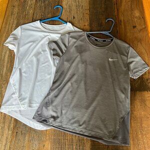 2 x Nike Miller Running Womens Short Sleeve Lightweight shirts with mesh backs.